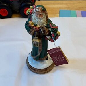 St. Nicholas figurine Halmark lights up Holiday Santa Figurine with Green Robe
